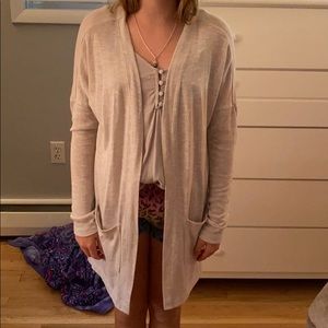 Cream color cardigan with side pockets
